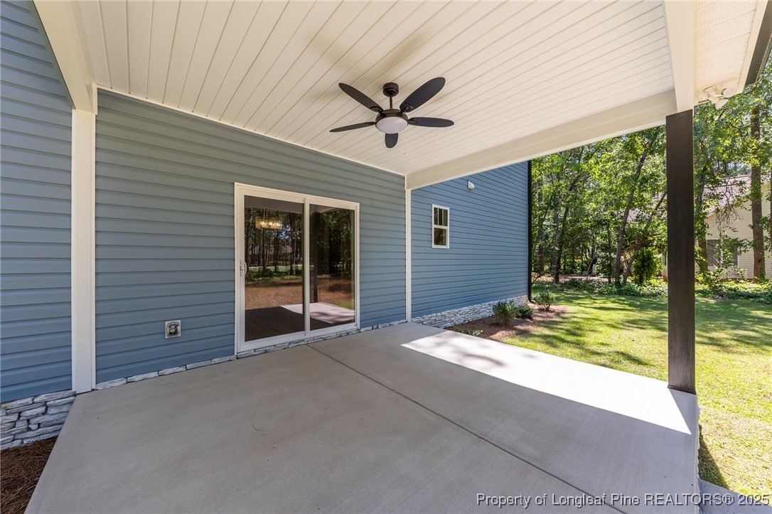 15980 Old Orchard Court Wagram, NC 28396 - Photo 5 of 33 a view of a house with a porch