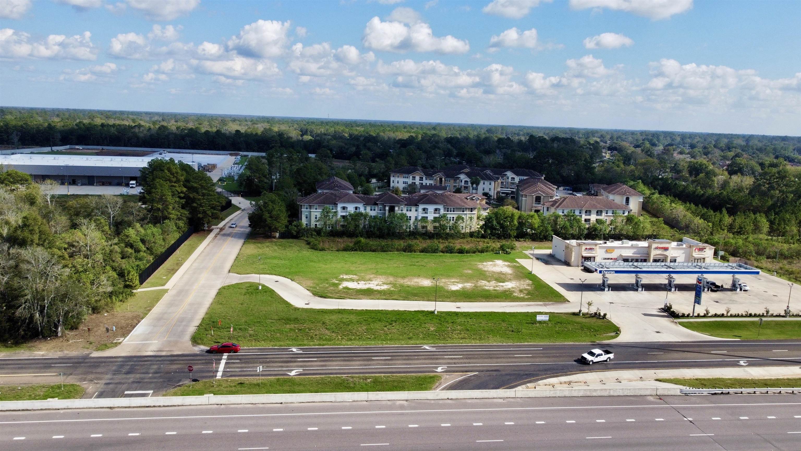 8190 Eastex Freeway Beaumont, TX 77708 - Photo 9 of 12 a view of a swimming pool with lawn chairs and a big yard