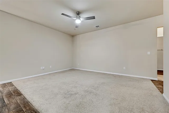 a view of kitchen with microwave and stove