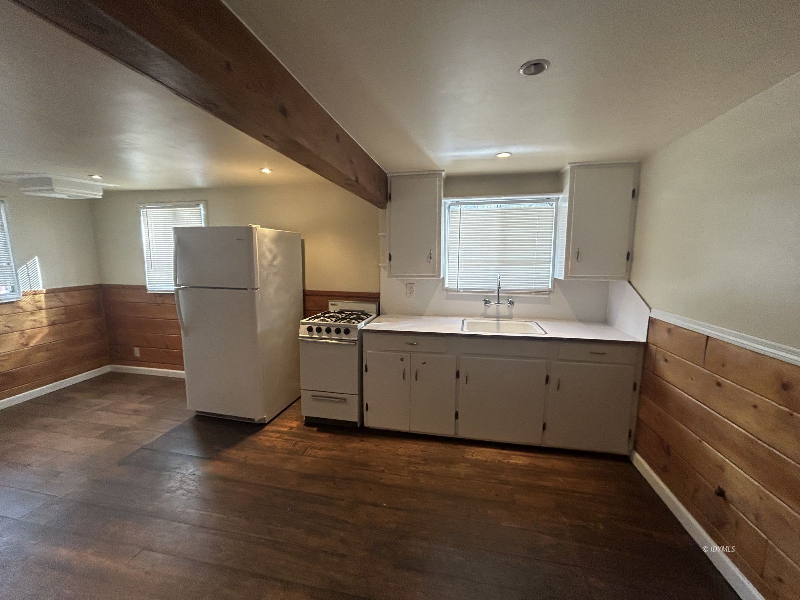 25055 Marion Ridge Drive, Unit 5 Idyllwild, CA 92549 - Photo 12 of 15 a view of a kitchen with a sink refrigerator and a window