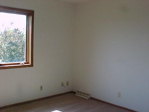 9-n047 Barron Road Maple Park, IL 60151 - Photo 12 of 16 an empty room with a window