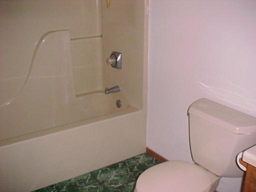 9-n047 Barron Road Maple Park, IL 60151 - Photo 13 of 16 a bathroom with a sink and a toilet