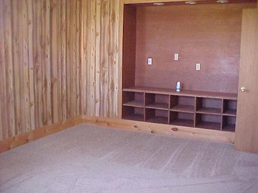 9-n047 Barron Road Maple Park, IL 60151 - Photo 15 of 16 a view of an empty room with wooden shelves