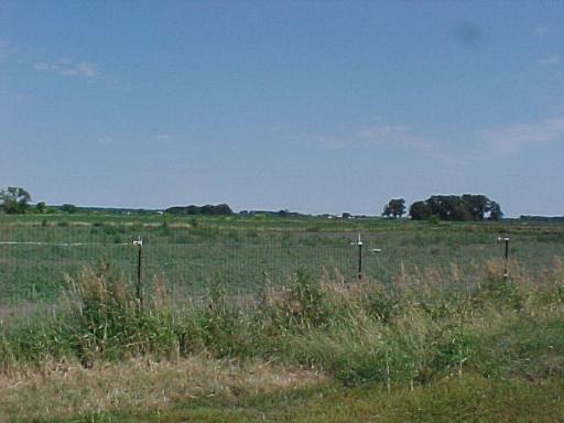 9-n047 Barron Road Maple Park, IL 60151 - Photo 3 of 16 a view of a green field with lots of bushes