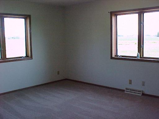 9-n047 Barron Road Maple Park, IL 60151 - Photo 10 of 16 an empty room with a window