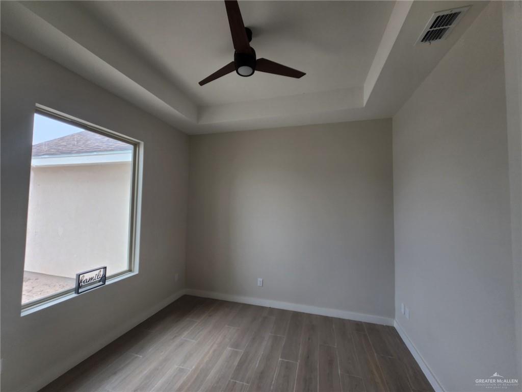 2529 Trinity Avenue McAllen, TX 78504 - Photo 13 of 21 an empty room with a window