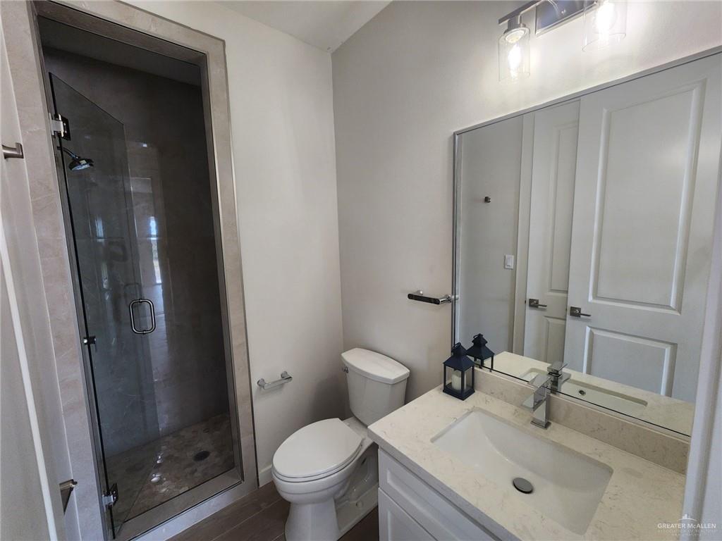 2529 Trinity Avenue McAllen, TX 78504 - Photo 15 of 21 a bathroom with a sink toilet and shower