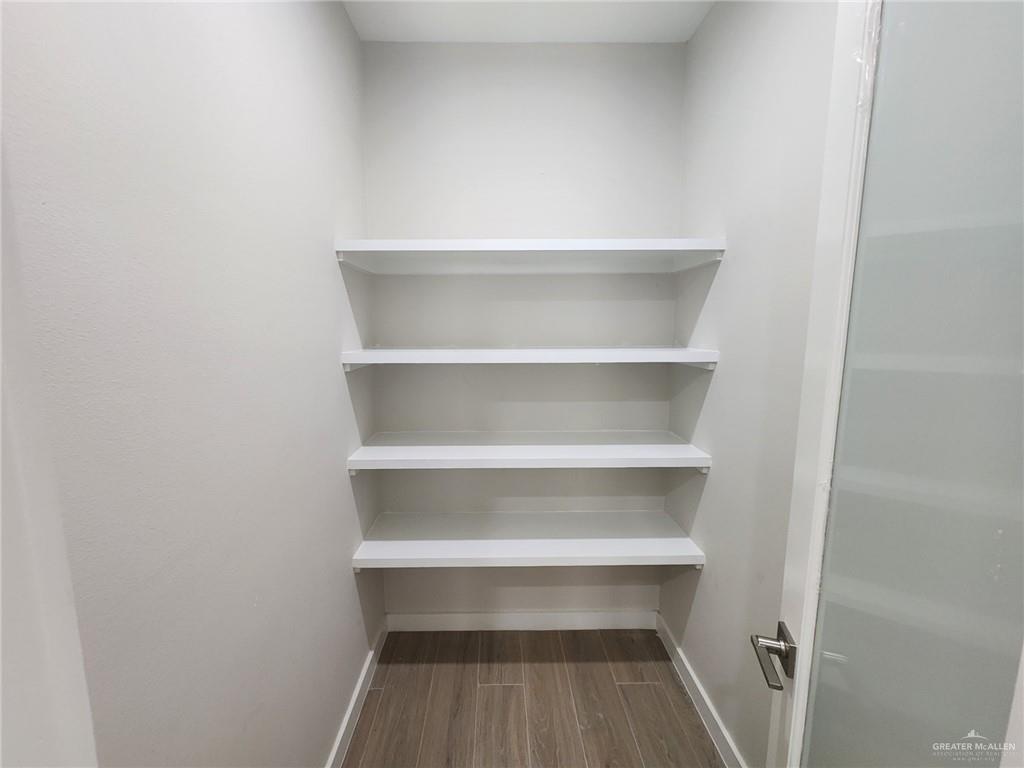 2529 Trinity Avenue McAllen, TX 78504 - Photo 8 of 21 a view of a room with a wooden floor