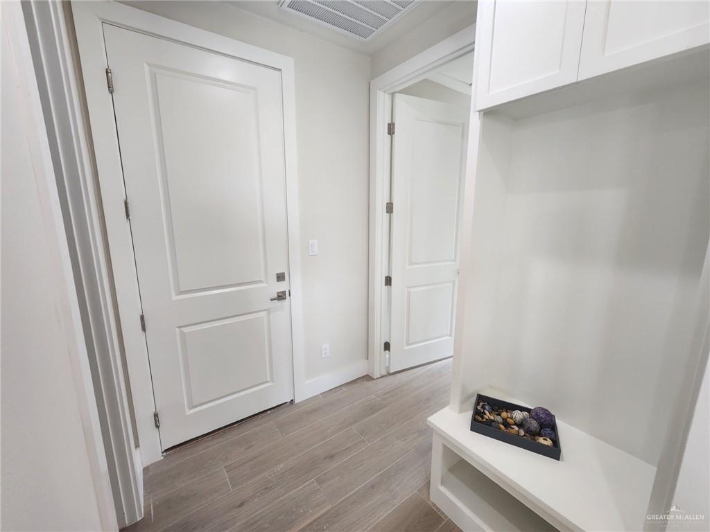 2529 Trinity Avenue McAllen, TX 78504 - Photo 9 of 21 a view of room with hardwood floor and closet