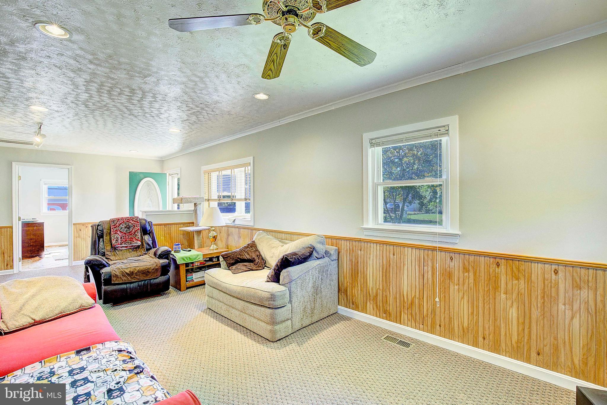 706 Kingfisher Road Deale, MD 20751 - Photo 9 of 30 a living room with furniture and a window