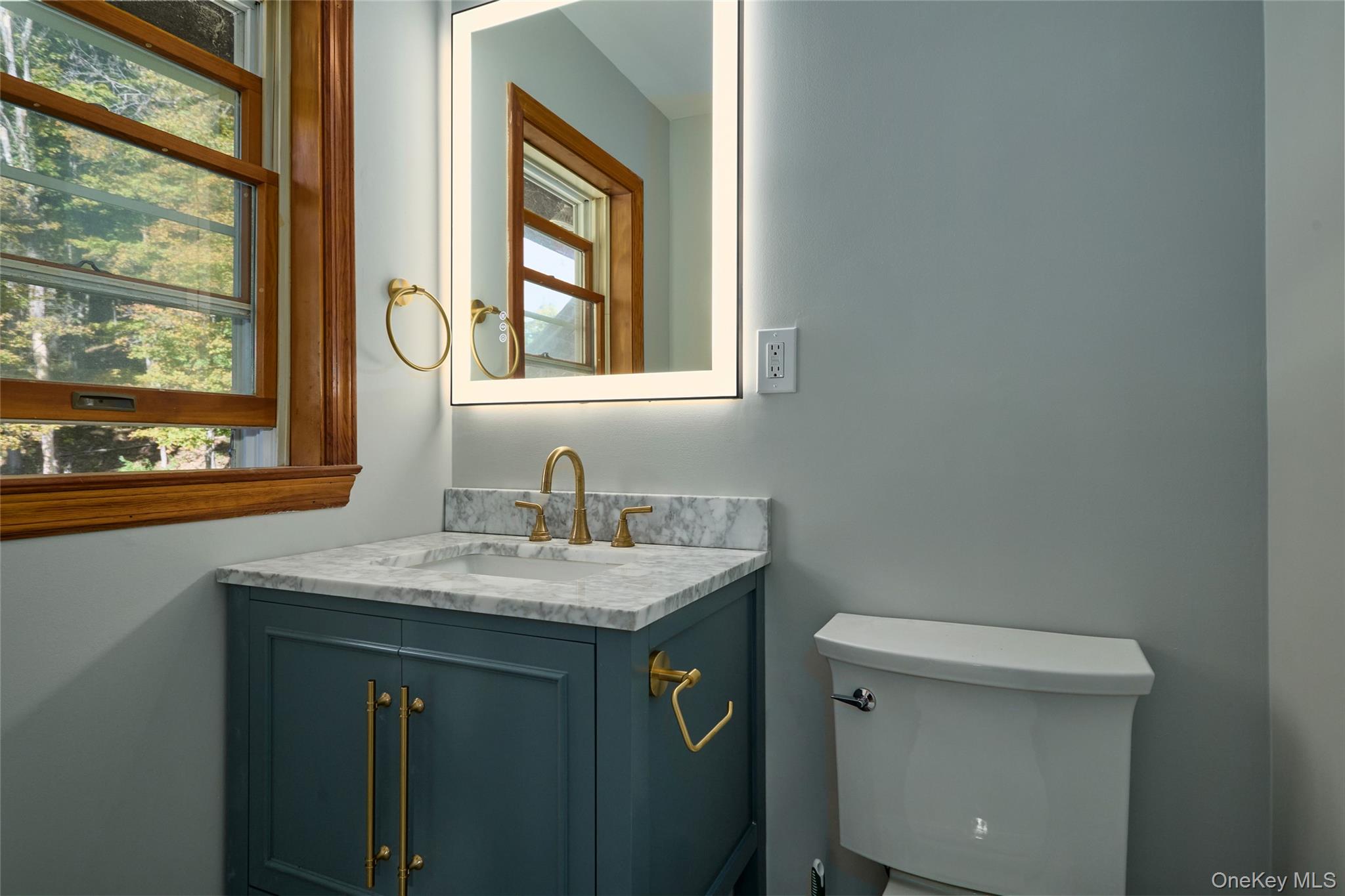 568 Oak Summit Road Millbrook, NY 12545 - Photo 24 of 50 Bathroom with healthy amount of natural light and vanity