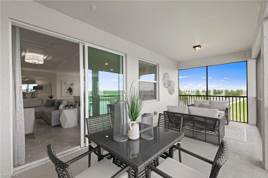 6008 Ellerston Way Avenue, Unit 1021 Immokalee, FL 34142 - Photo 12 of 50 Sunroom / solarium featuring an outdoor living space