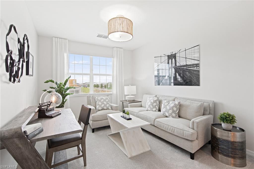 6008 Ellerston Way Avenue, Unit 1021 Immokalee, FL 34142 - Photo 26 of 50 Living room featuring light carpet