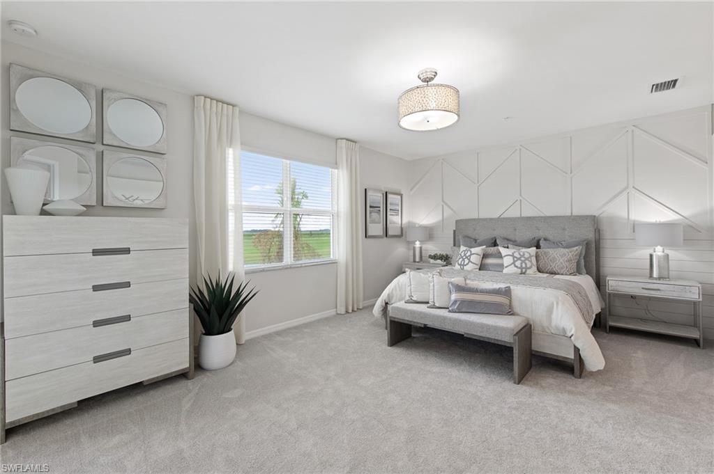 6008 Ellerston Way Avenue, Unit 1021 Immokalee, FL 34142 - Photo 31 of 50 Bedroom featuring light colored carpet and baseboards