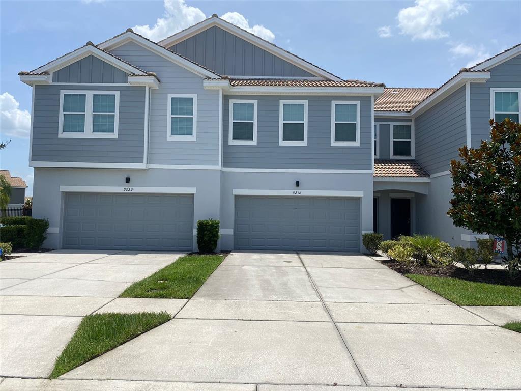 9218 Shepton Street Orlando, FL 32825 - Photo 1 of 1 a front view of house with yard