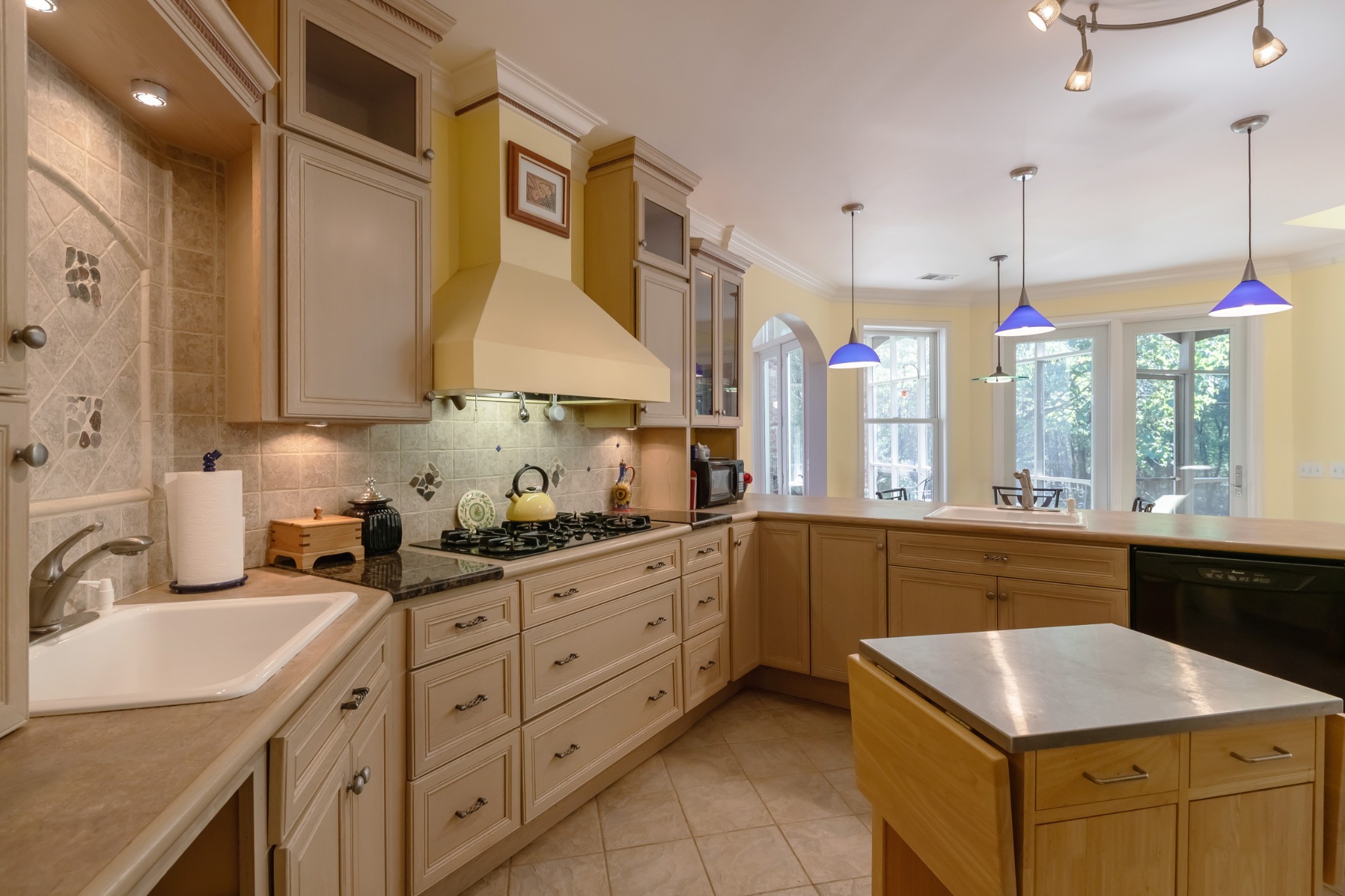 7650 Sleepy Summit Road Fairview, TN 37062 - Photo 11 of 30 a kitchen with sink cabinets and window