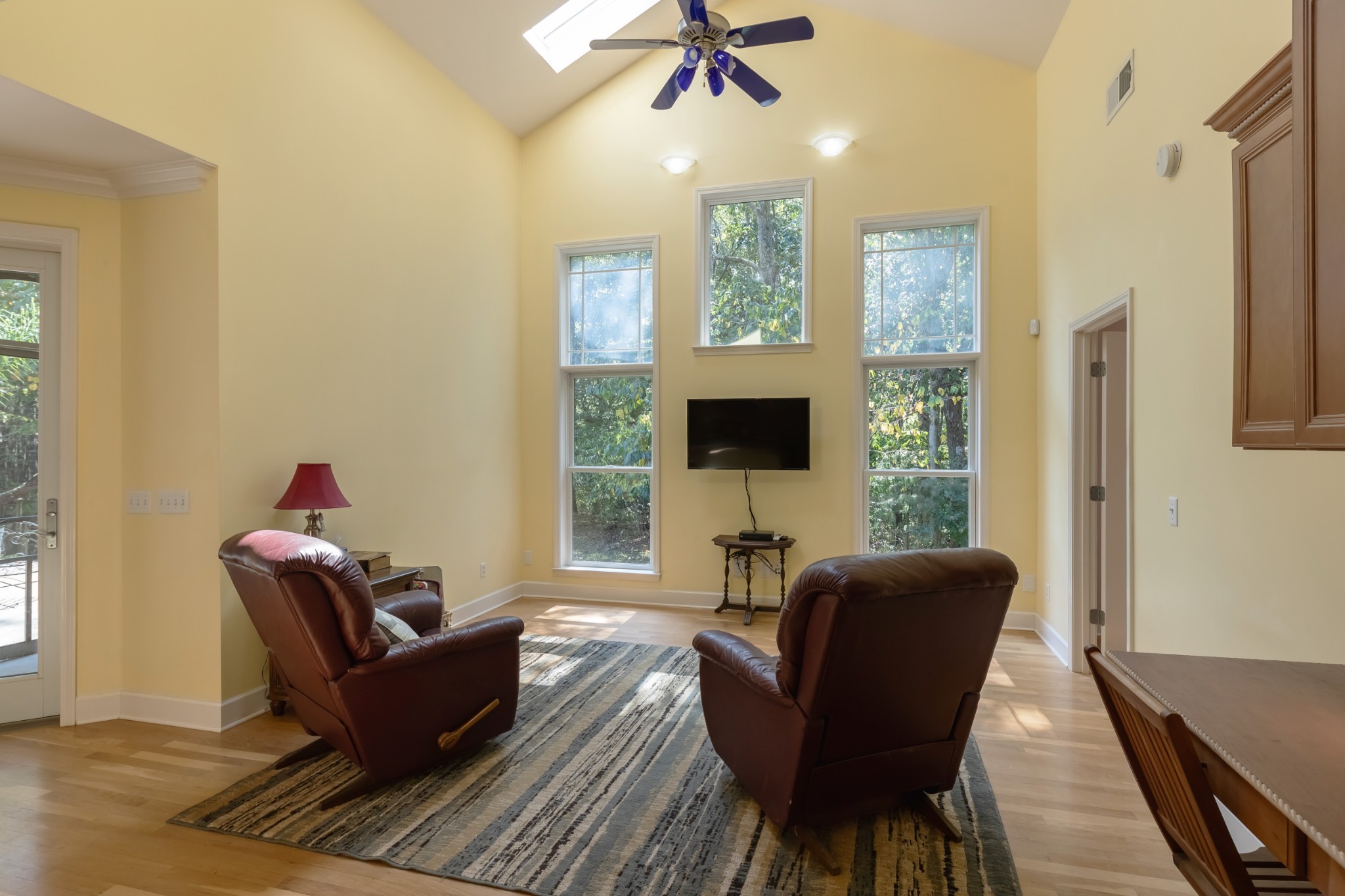 7650 Sleepy Summit Road Fairview, TN 37062 - Photo 12 of 30 a living room with furniture and a flat screen tv