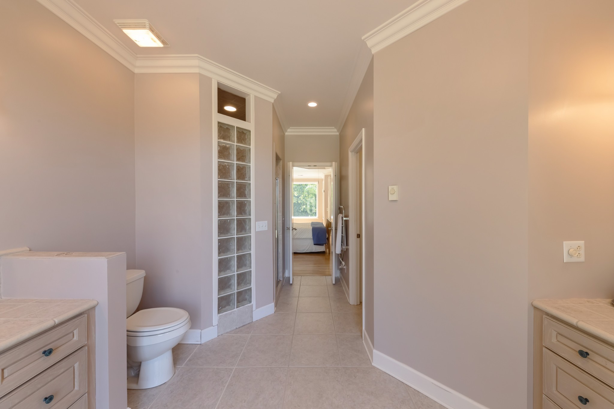 7650 Sleepy Summit Road Fairview, TN 37062 - Photo 16 of 30 a bathroom with a toilet a sink and shower