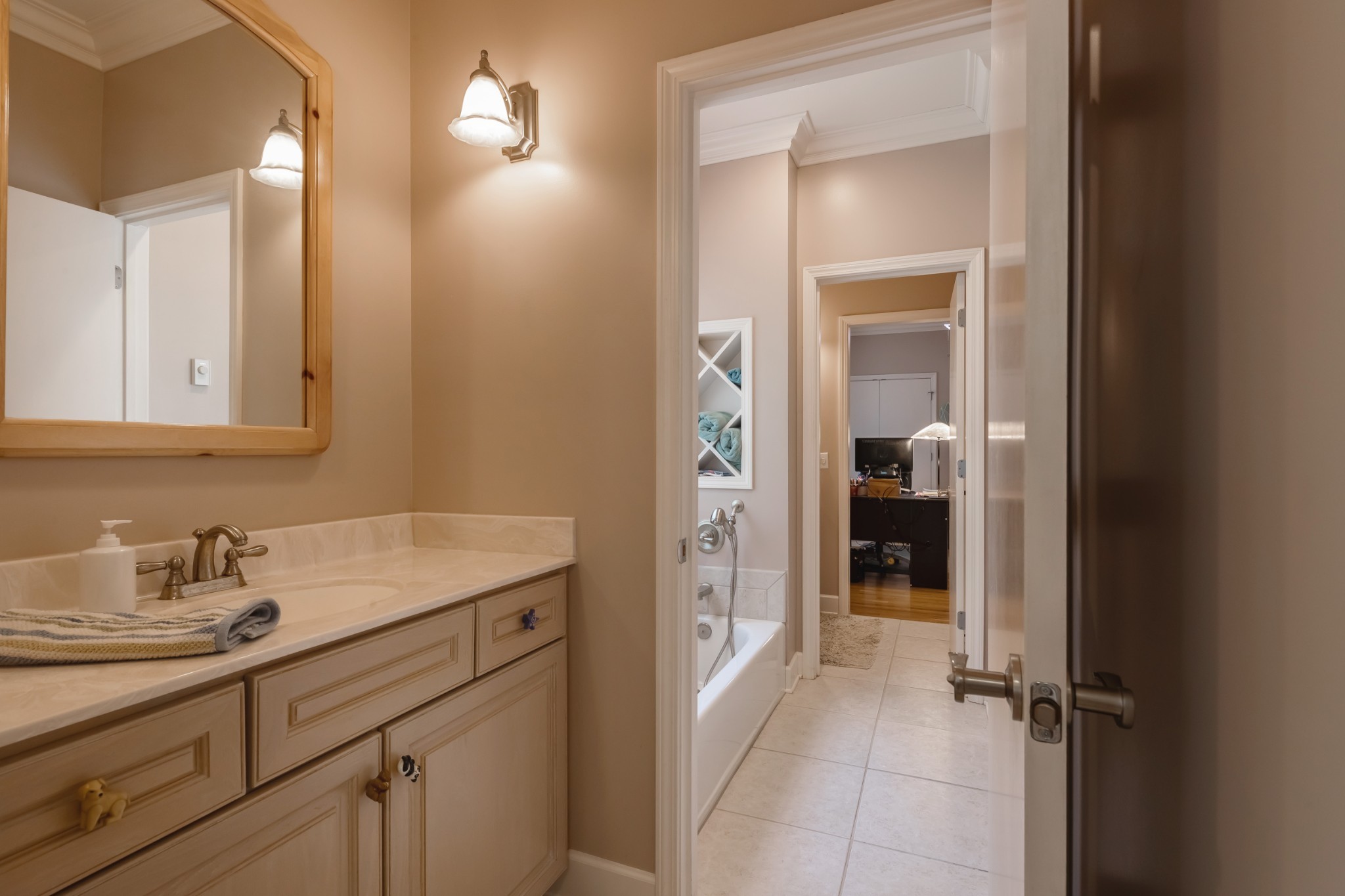 7650 Sleepy Summit Road Fairview, TN 37062 - Photo 19 of 30 a bathroom with a sink and a mirror