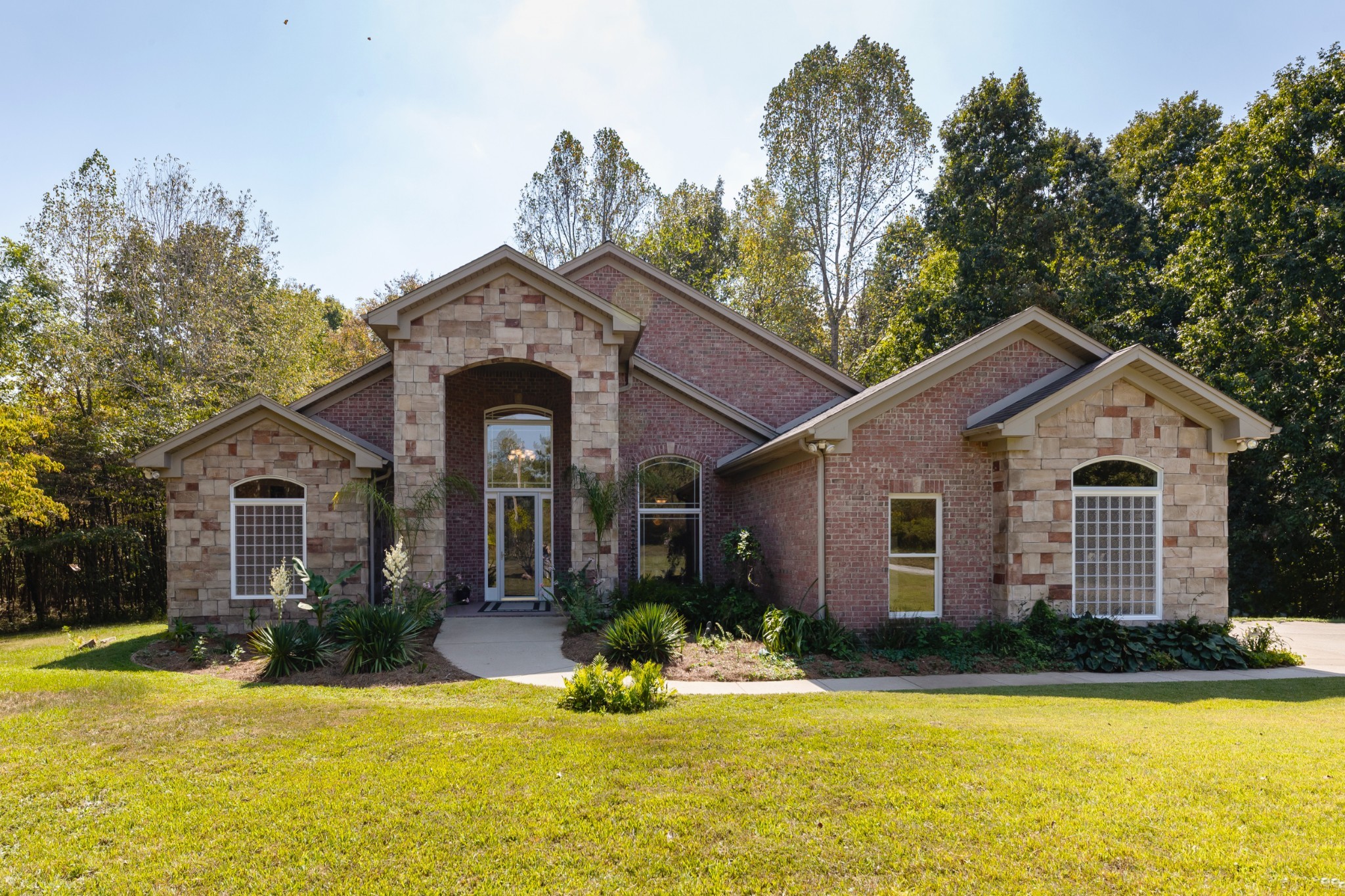 7650 Sleepy Summit Road Fairview, TN 37062 - Photo 2 of 30 a front view of a house with a yard