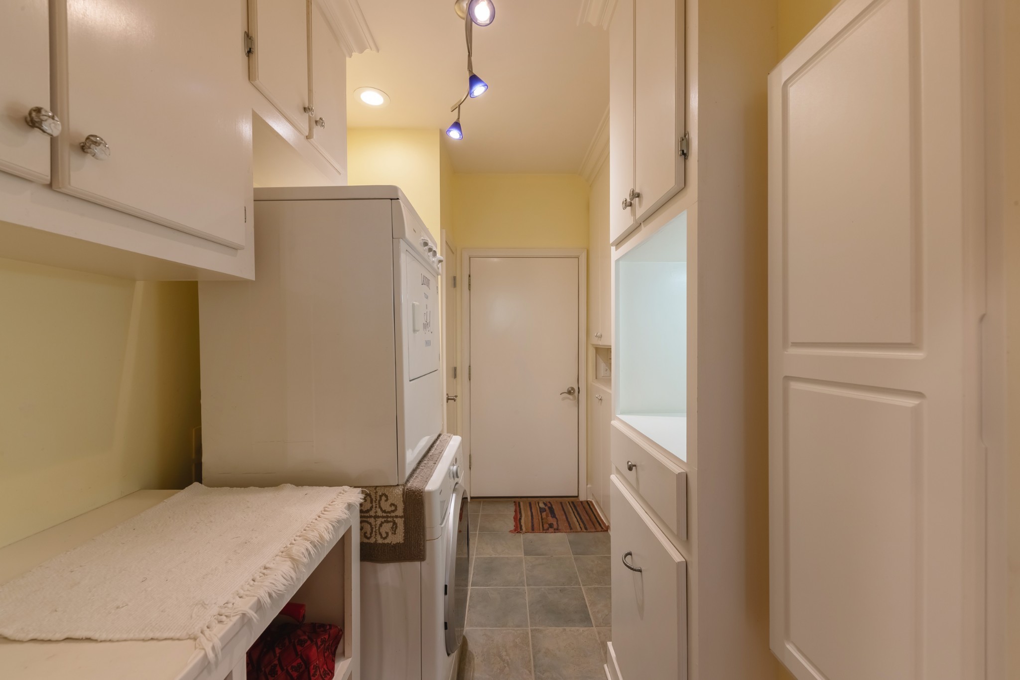 7650 Sleepy Summit Road Fairview, TN 37062 - Photo 23 of 30 a bathroom with a sink and a mirror
