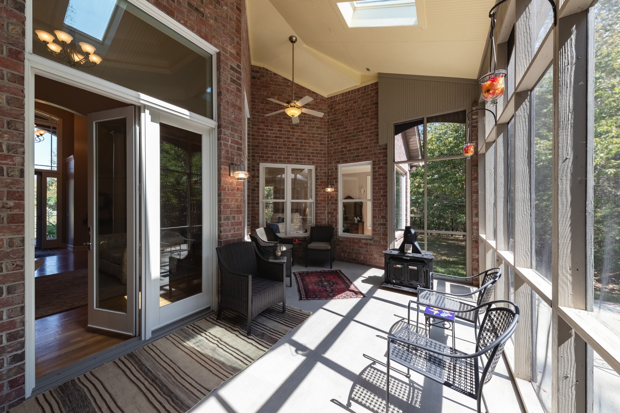 7650 Sleepy Summit Road Fairview, TN 37062 - Photo 24 of 30 a balcony with furniture and wooden floor