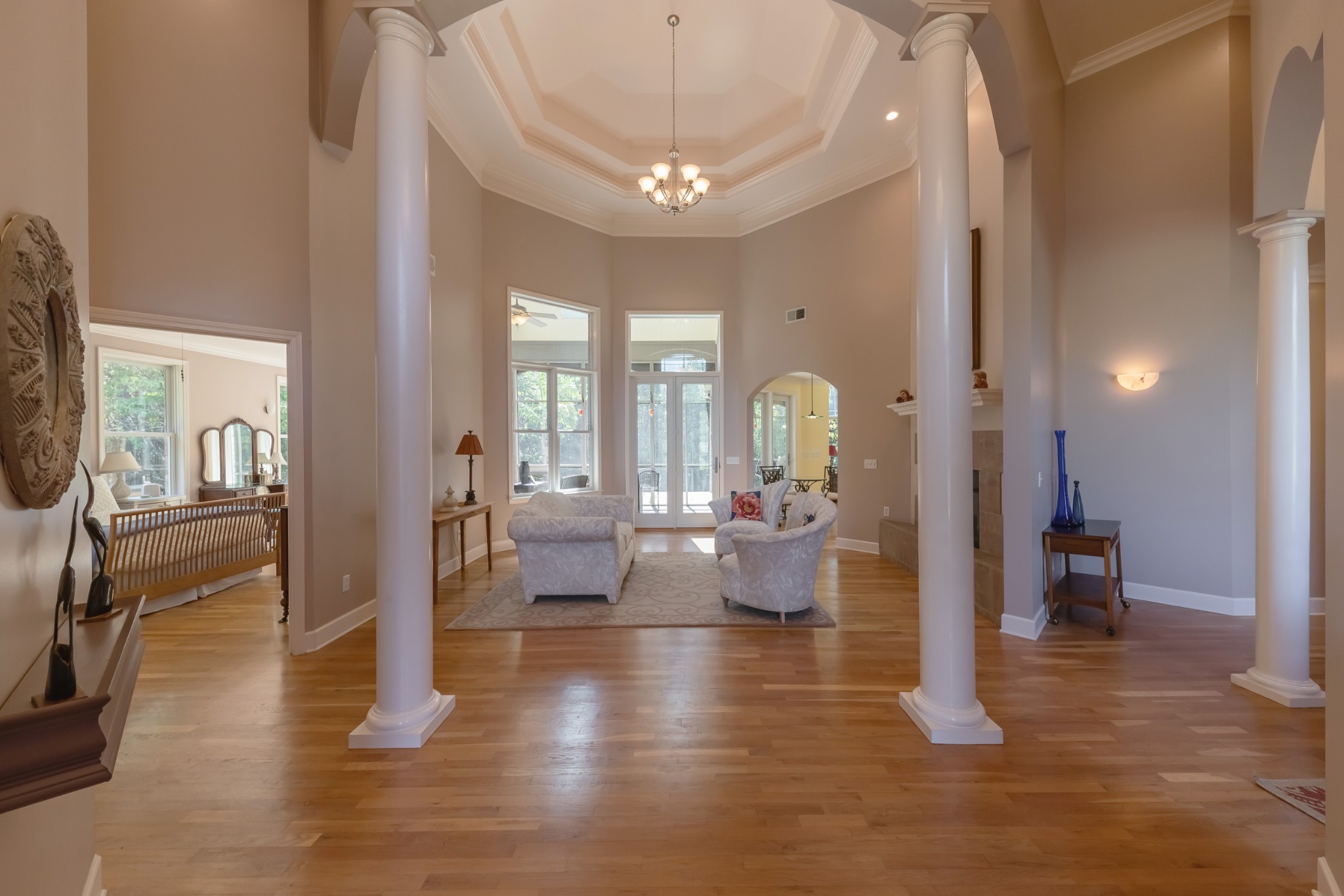 7650 Sleepy Summit Road Fairview, TN 37062 - Photo 4 of 30 a living room with fireplace furniture and a wooden floor