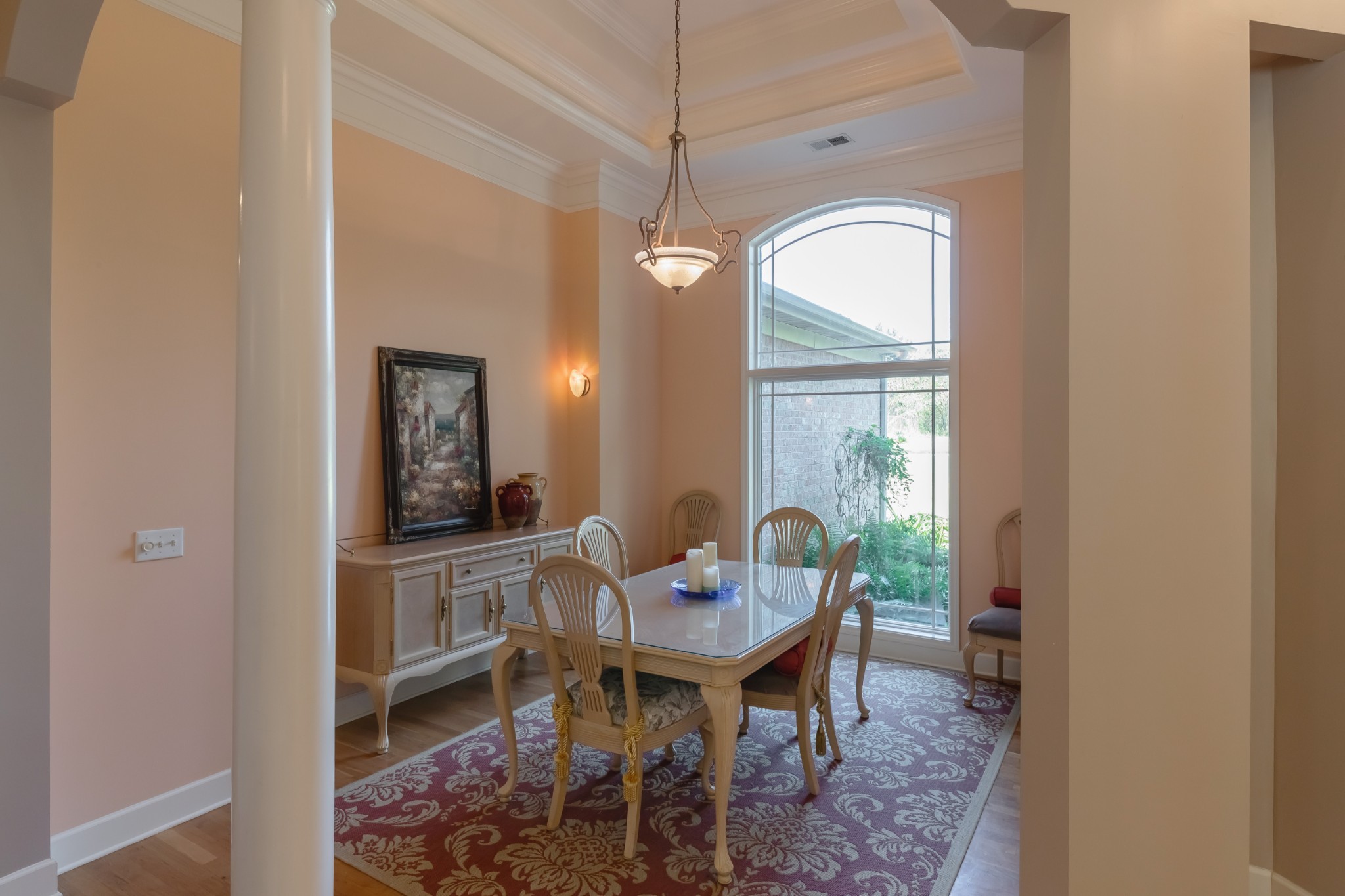 7650 Sleepy Summit Road Fairview, TN 37062 - Photo 7 of 30 a view of a dining room with furniture window and wooden floor