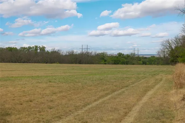 a view of a lake and mountain in the back