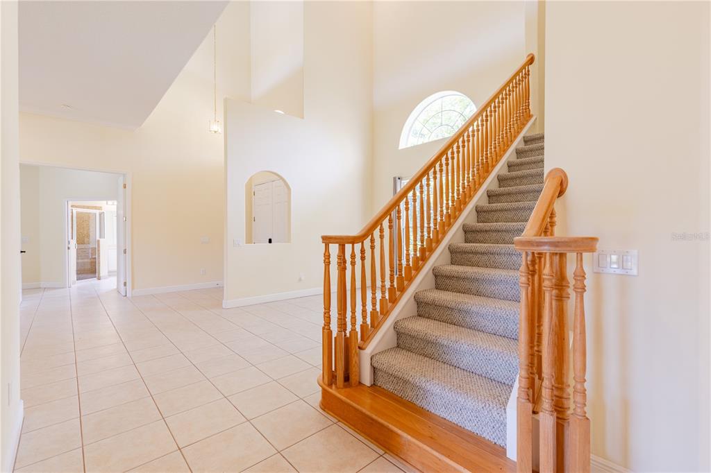 2718 Knightsbridge Road Clermont, FL 34711 - Photo 32 of 72 a view of entryway and hall with wooden floor