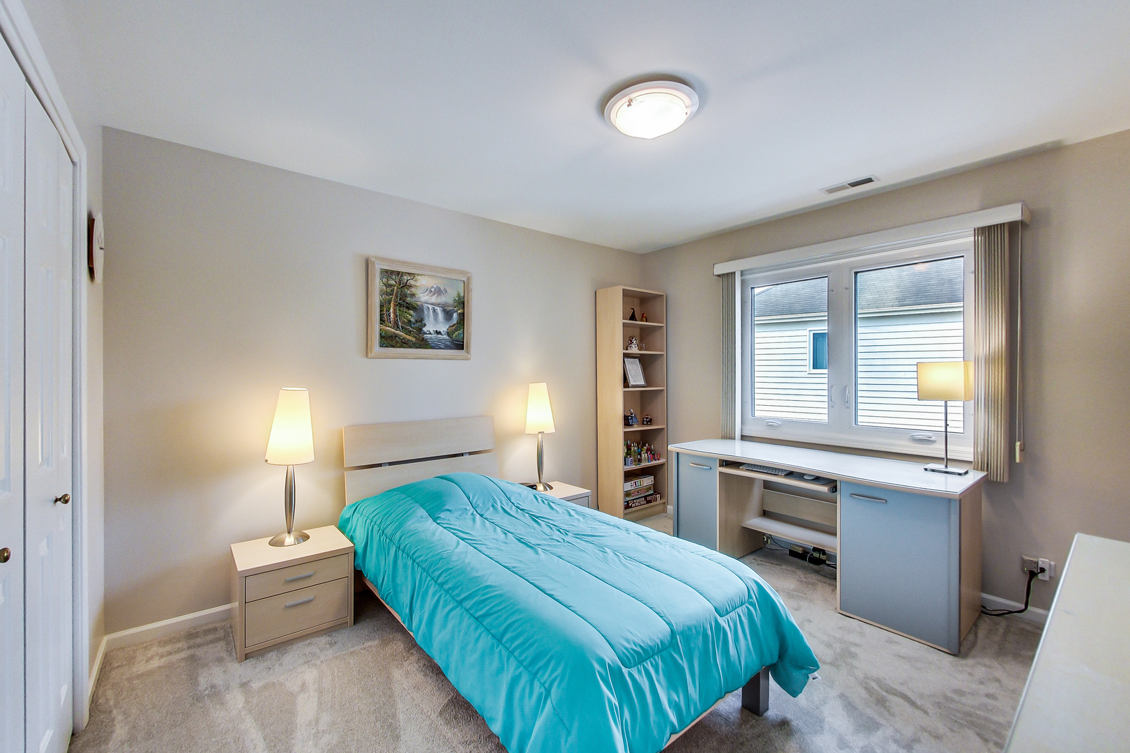790 Edgemere Road Buffalo Grove, IL 60089 - Photo 25 of 42 a bedroom with a bed and wooden floor