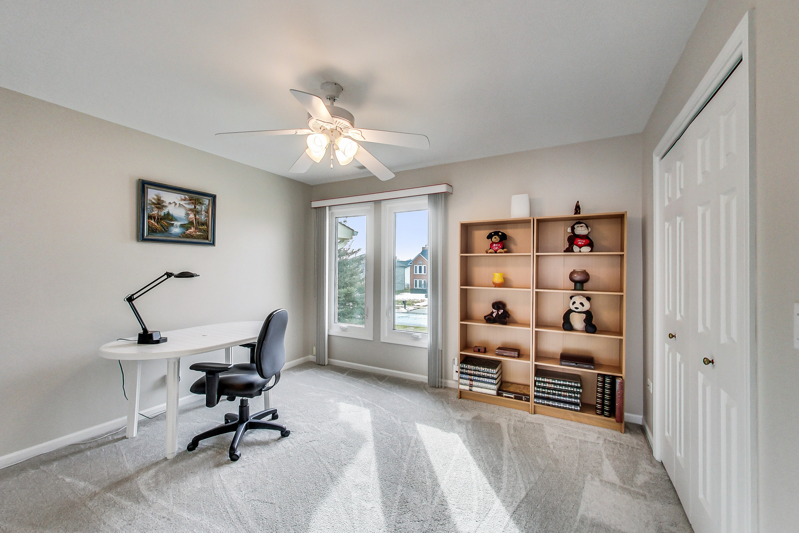 790 Edgemere Road Buffalo Grove, IL 60089 - Photo 27 of 42 a view of a workspace with furniture and a window