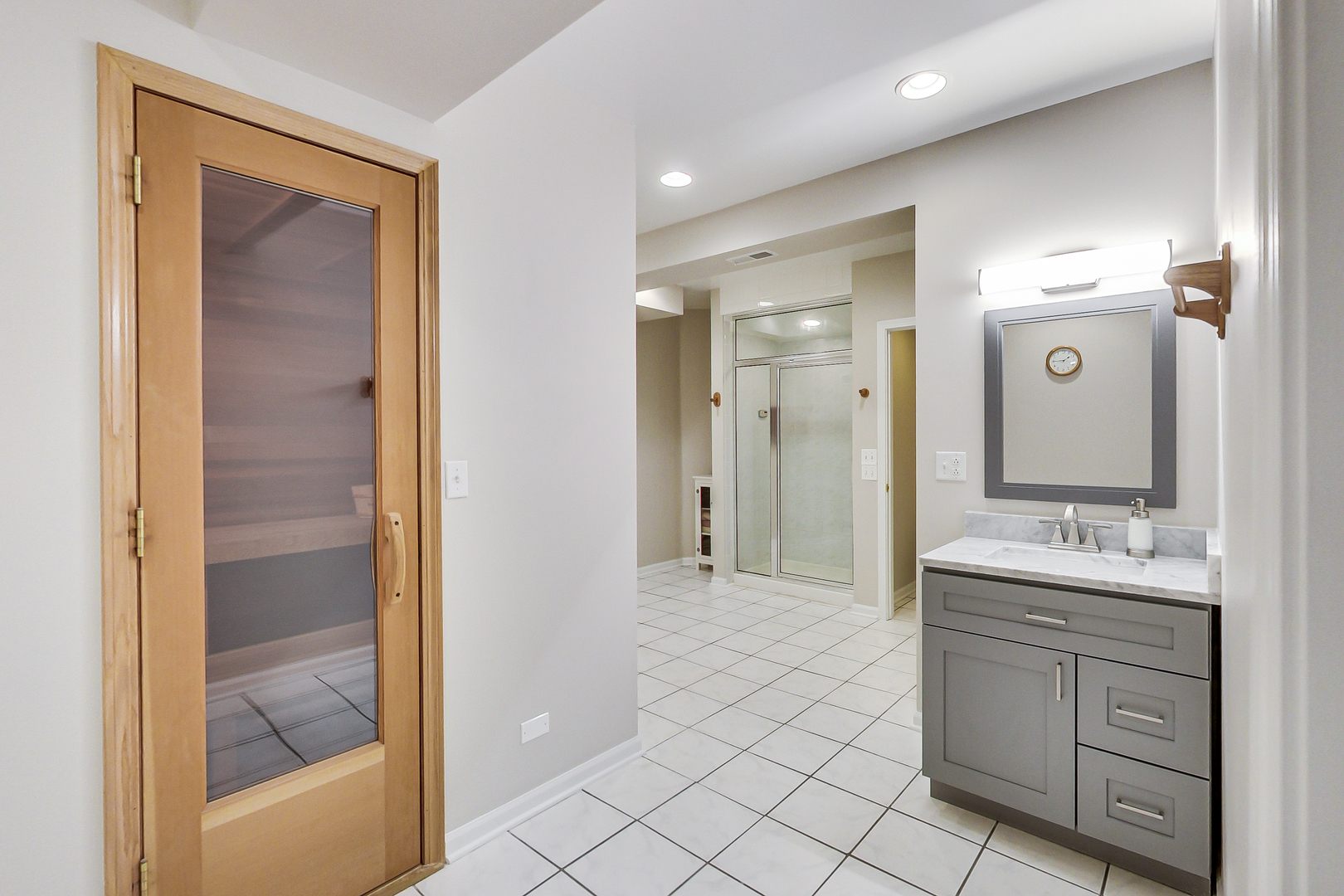 790 Edgemere Road Buffalo Grove, IL 60089 - Photo 34 of 42 a bathroom with a double vanity sink and mirror