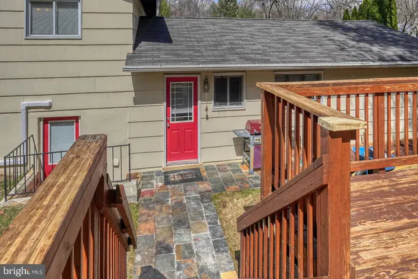 a view of stairs and wooden floor