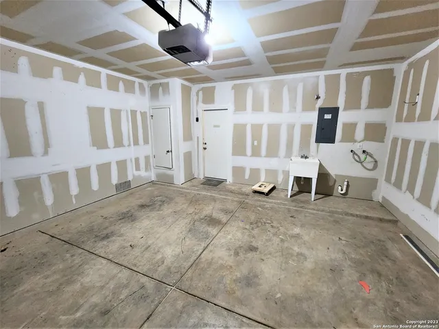 a view of an empty room with stairs
