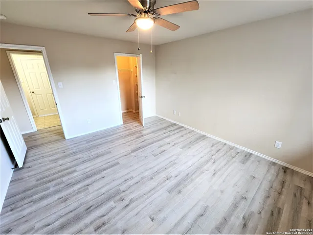 a bathroom with a double vanity sink and mirror