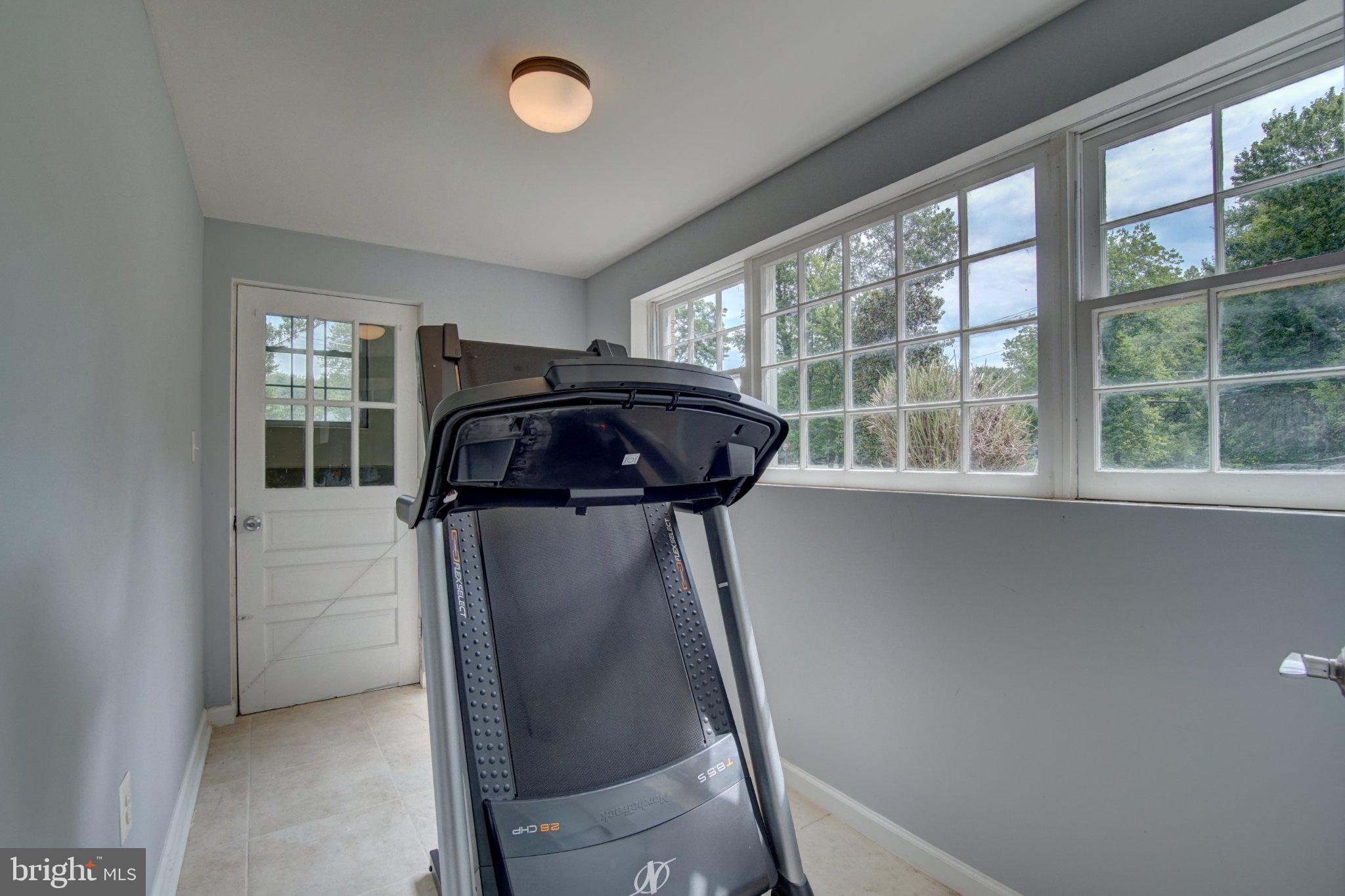 900 Walker Road Great Falls, VA 22066 - Photo 38 of 52 Bright and airy fitness space.