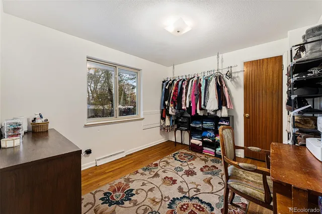 a bed room with a bed and a window