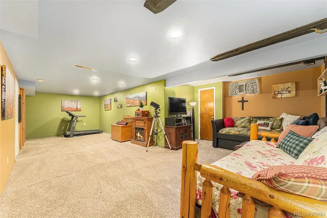 a bed room with a bed and a large mirror