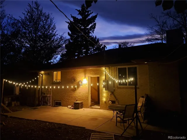a view of a chairs and table in patio