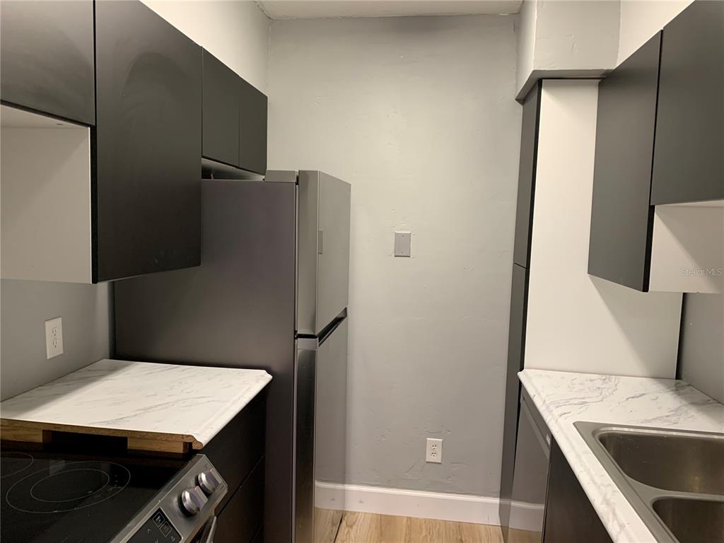 435 Wymore Road, Unit 207 Altamonte Springs, FL 32714 - Photo 5 of 16 a room with storage and utility