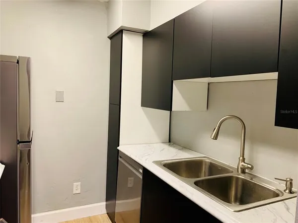 a view of a room that has a sink