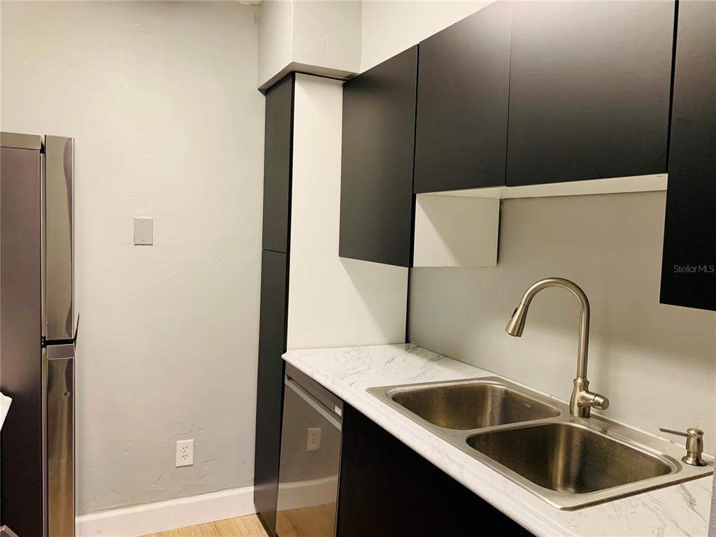 435 Wymore Road, Unit 207 Altamonte Springs, FL 32714 - Photo 6 of 16 a close view of a sink and tap