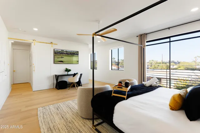 a bed room with a bed and a couch