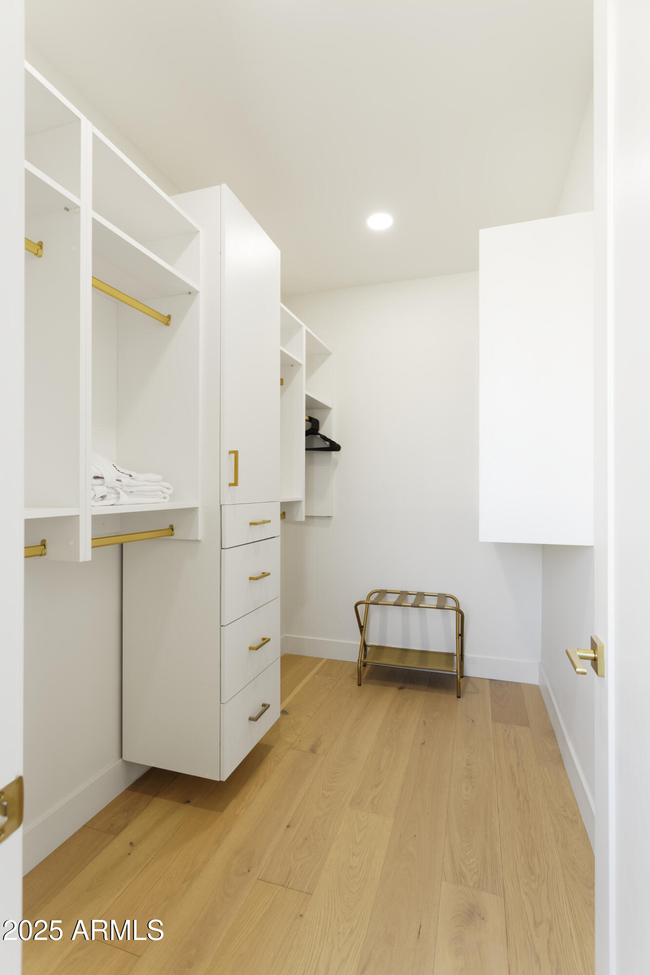 7520 East Highland Avenue Scottsdale, AZ 85251 - Photo 18 of 52 a bedroom with a bed and a cabinets