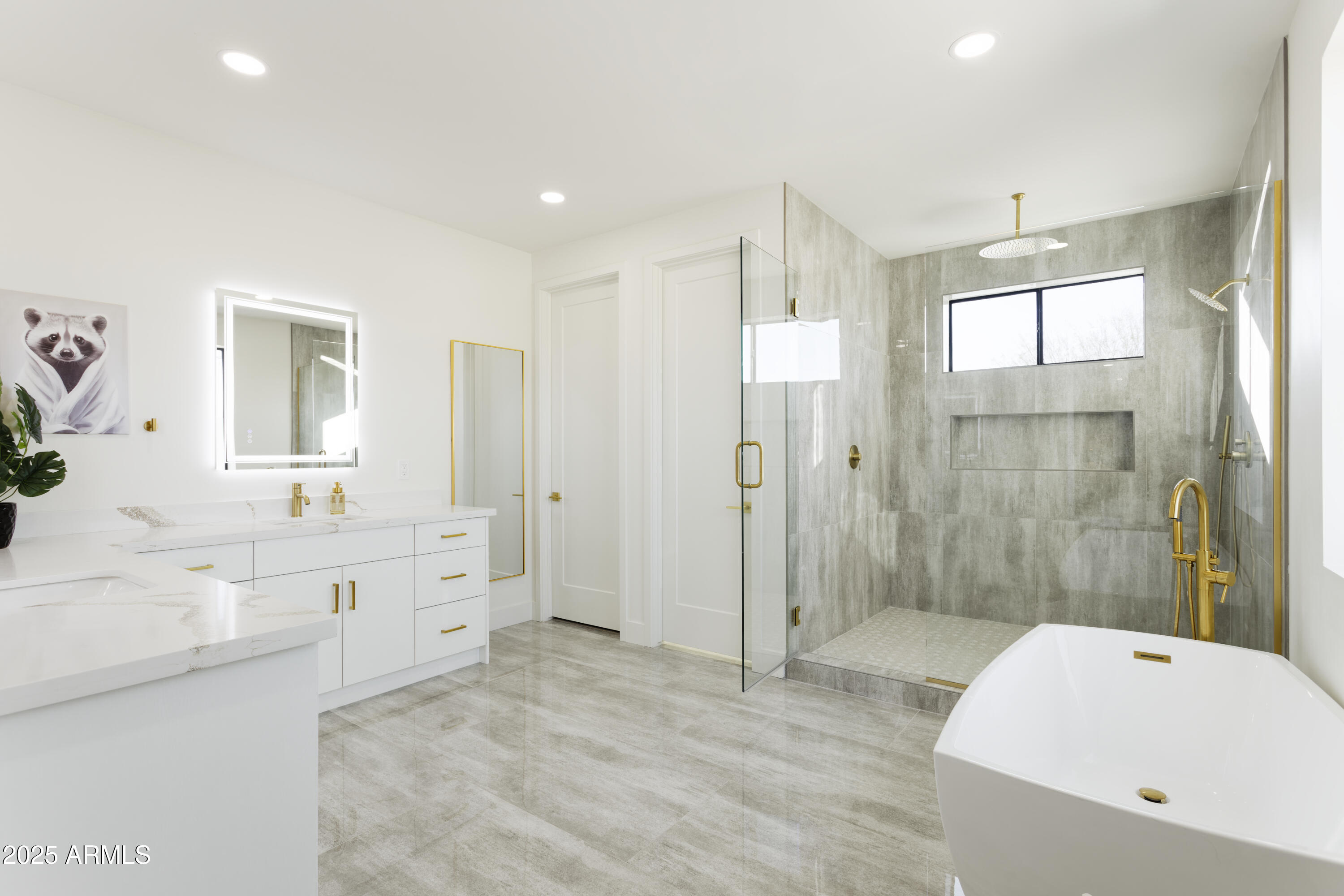 7520 East Highland Avenue Scottsdale, AZ 85251 - Photo 19 of 52 a large bathroom with a sink mirror toilet shower and bathtub