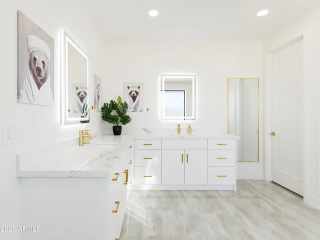 a bathroom with a sink a mirror and a shower