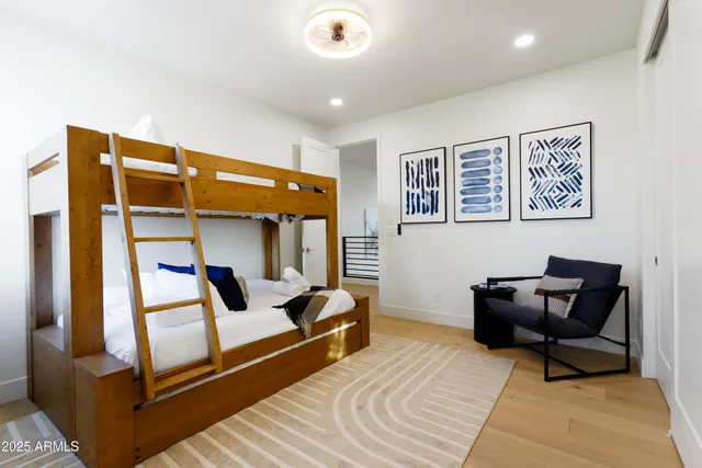 a bedroom with a bed and furniture