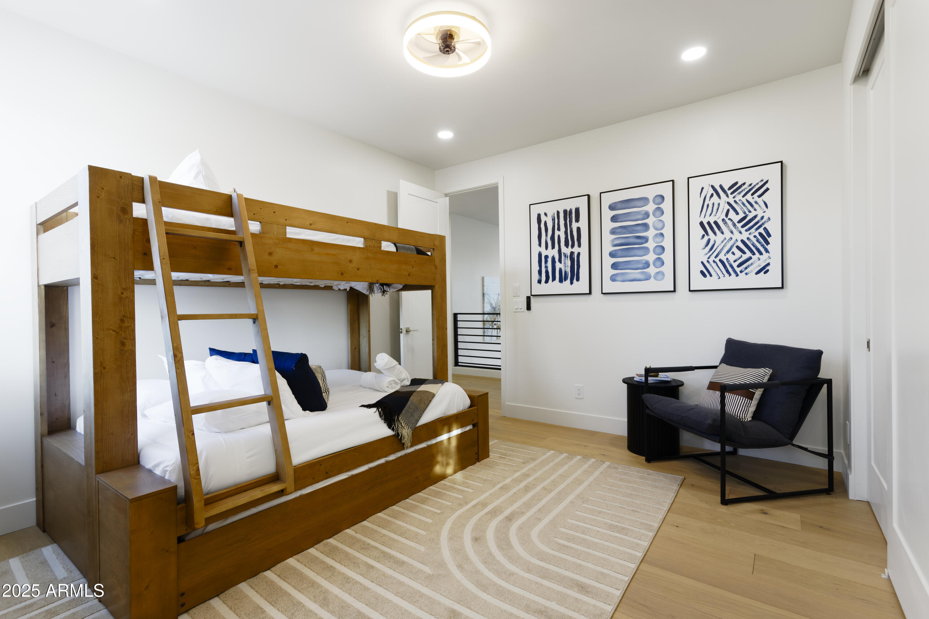 7520 East Highland Avenue Scottsdale, AZ 85251 - Photo 21 of 52 a bedroom with a bed and furniture