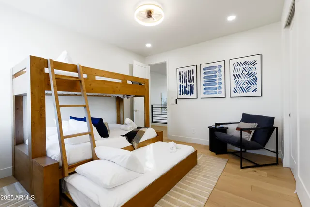 a bedroom with a bed and furniture